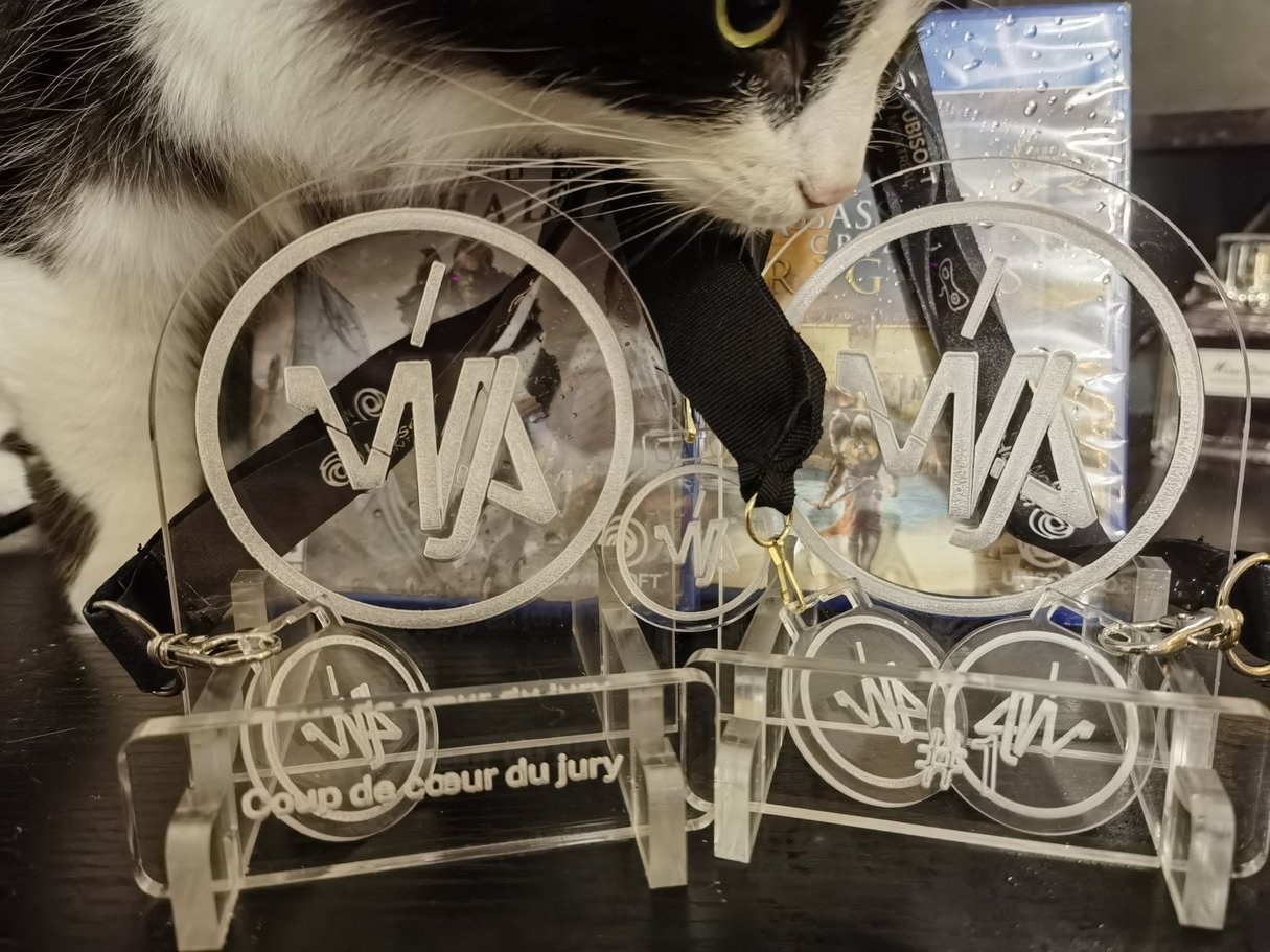 Italia the studio cat with Silence Square's Montréal Game Jam awards